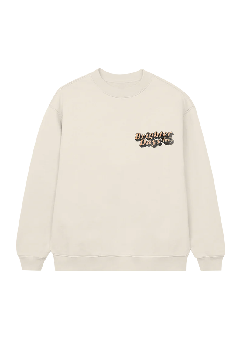 Ariana Grande Brighter Days Memories cream crewneck sweatshirt with minimalist chest logo graphic front view