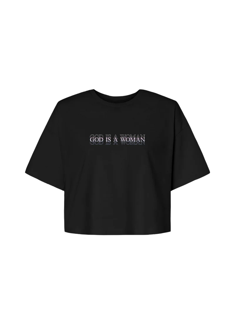 Black Ariana Grande God Is A Woman cropped T-shirt with minimalist layered text graphic and relaxed modern fit