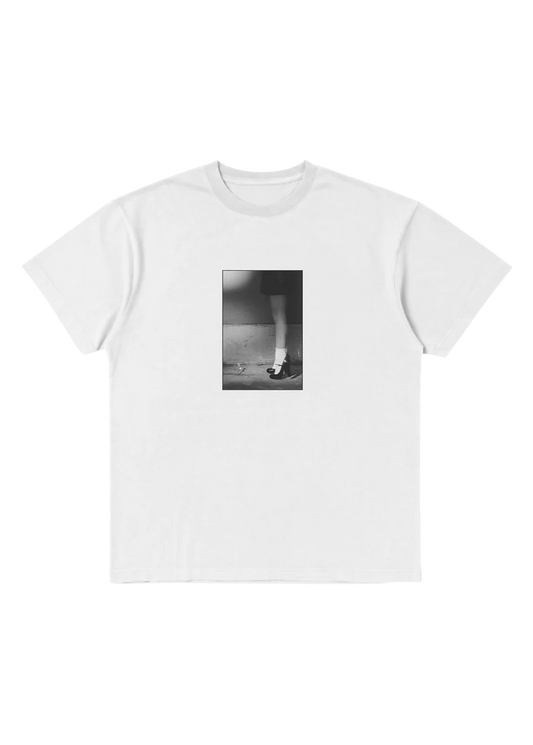 Ariana Grande Petal In the Pavement White T-Shirt front view with black and white vertical pavement photo graphic