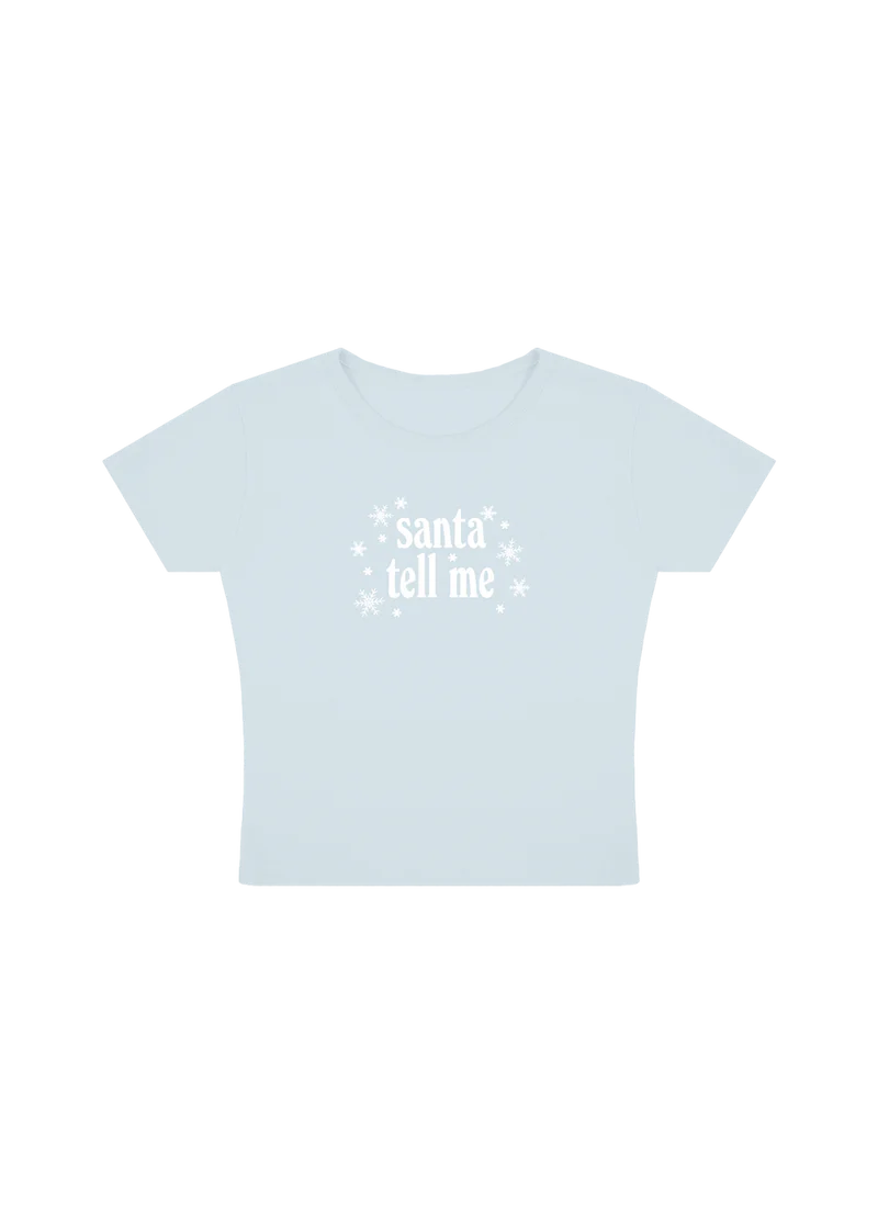 Ariana Grande Santa Tell Me light blue baby t-shirt with white snowflake holiday graphic front view