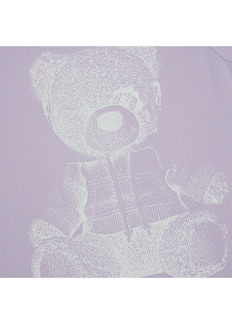 Ariana Grande teddy ribbed tank top close-up featuring reflective bear artwork on lavender fabric