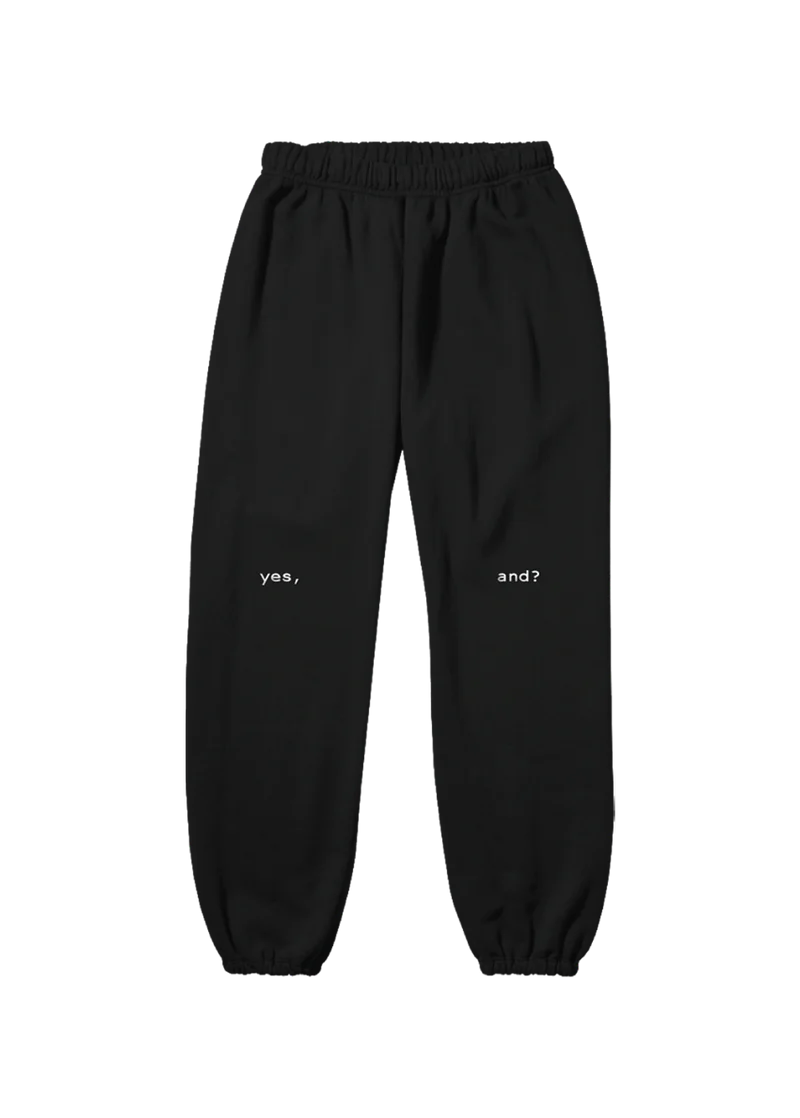 Black Ariana Grande yes and sweatpants with minimalist yes and text graphic for relaxed streetwear style