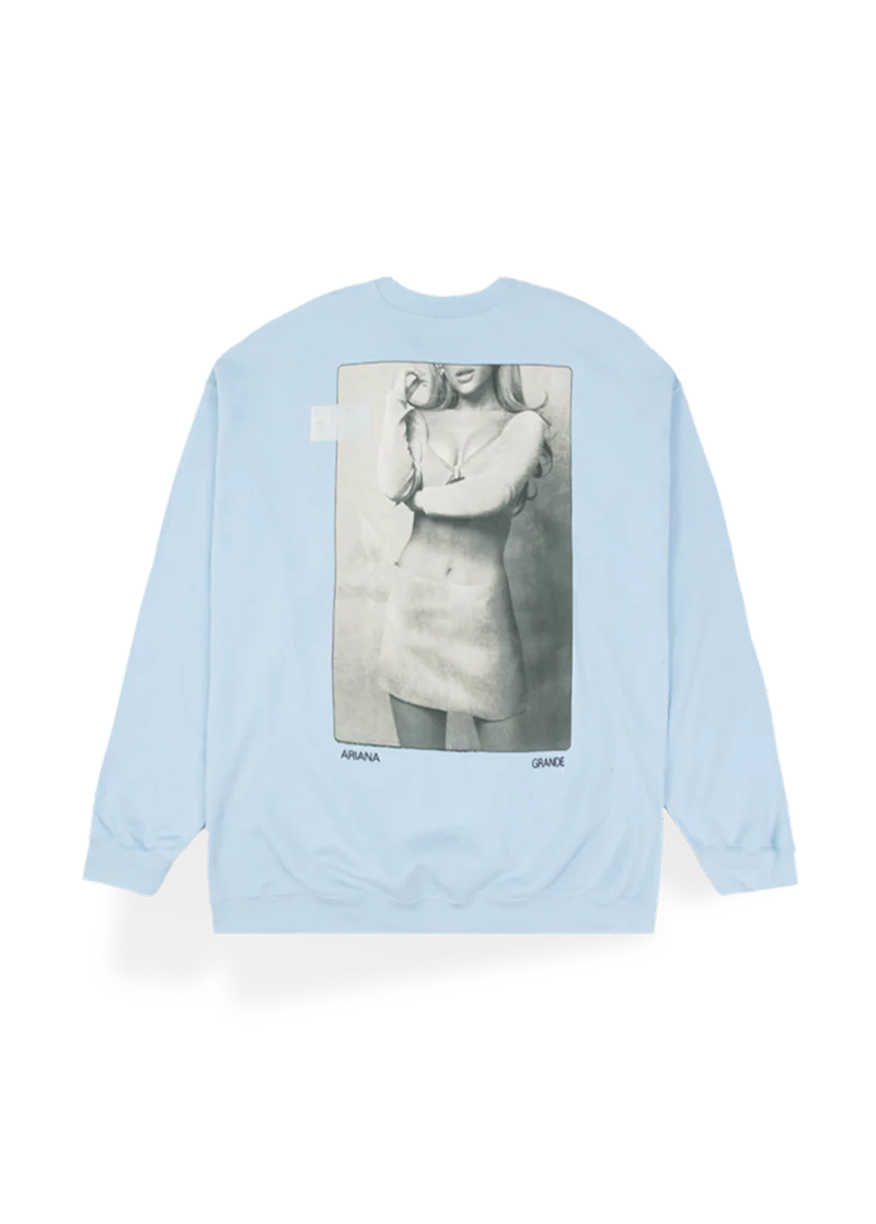 Light blue Positions crewneck with vintage Ariana Grande portrait graphic and oversized fit back view