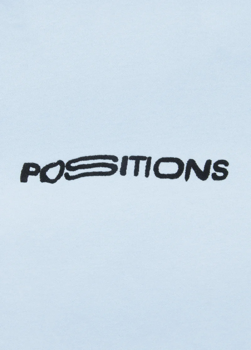 Light blue Positions crewneck with black embroidered Positions logo graphic detail